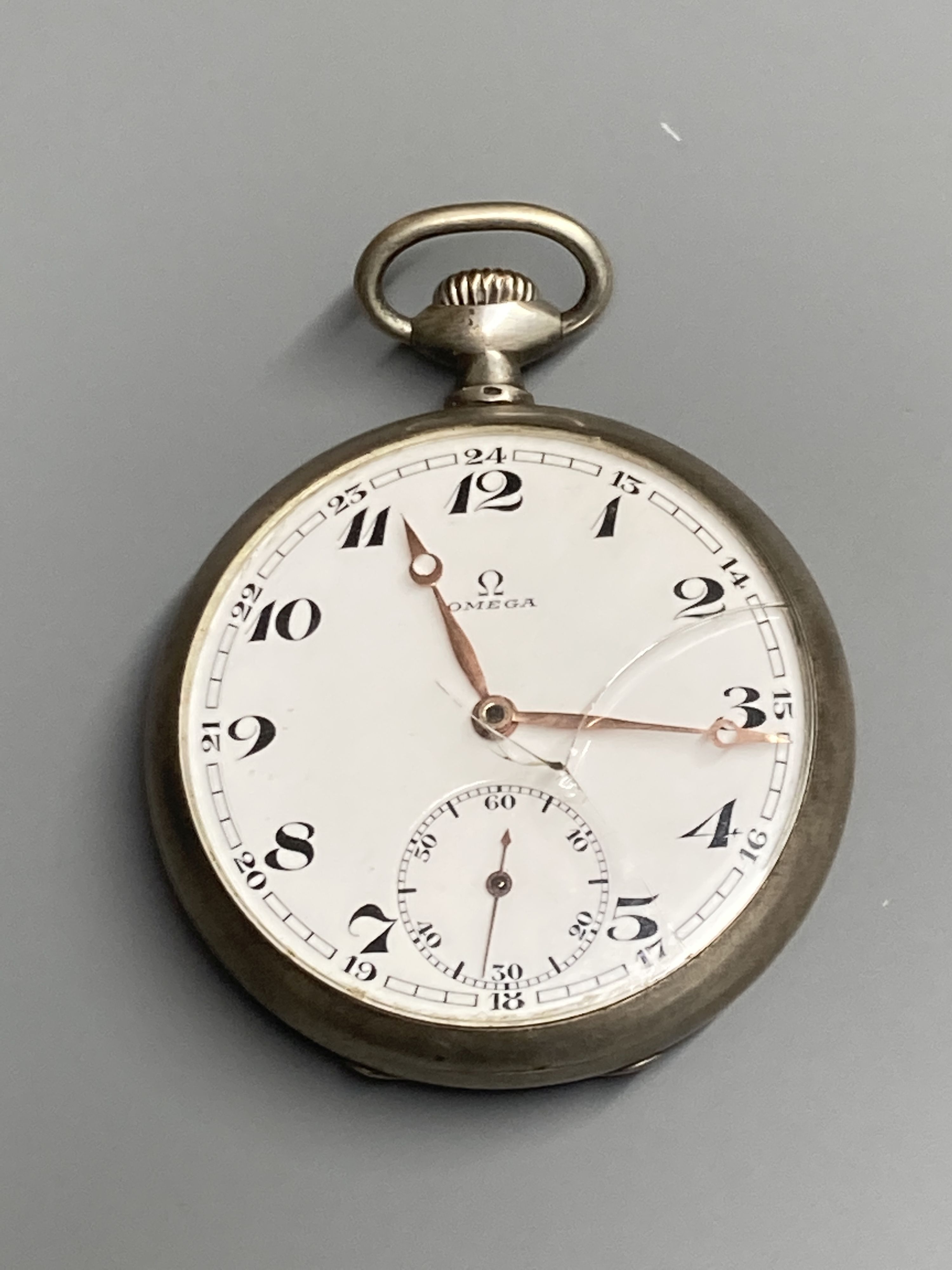 An early 20th century engine turned 800 standard Omega open face keyless pocket watch (glass a.f.)